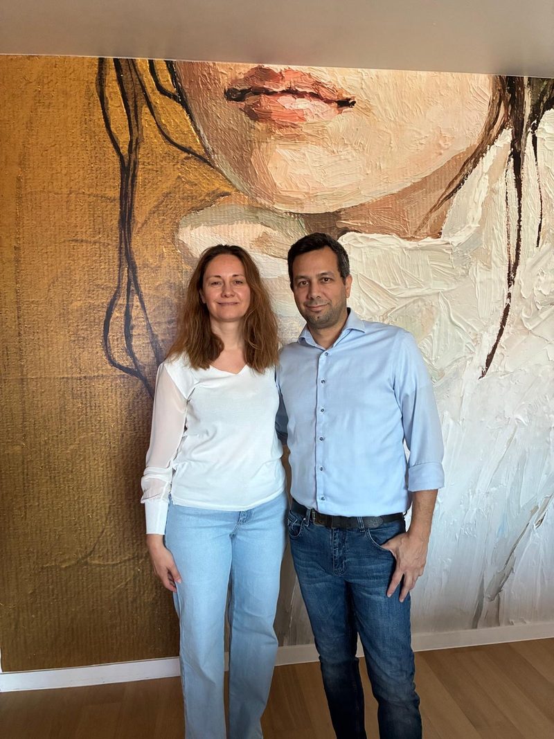 Seden and Caner Tek in the living room of their newly bought apartment in Sterrebeek